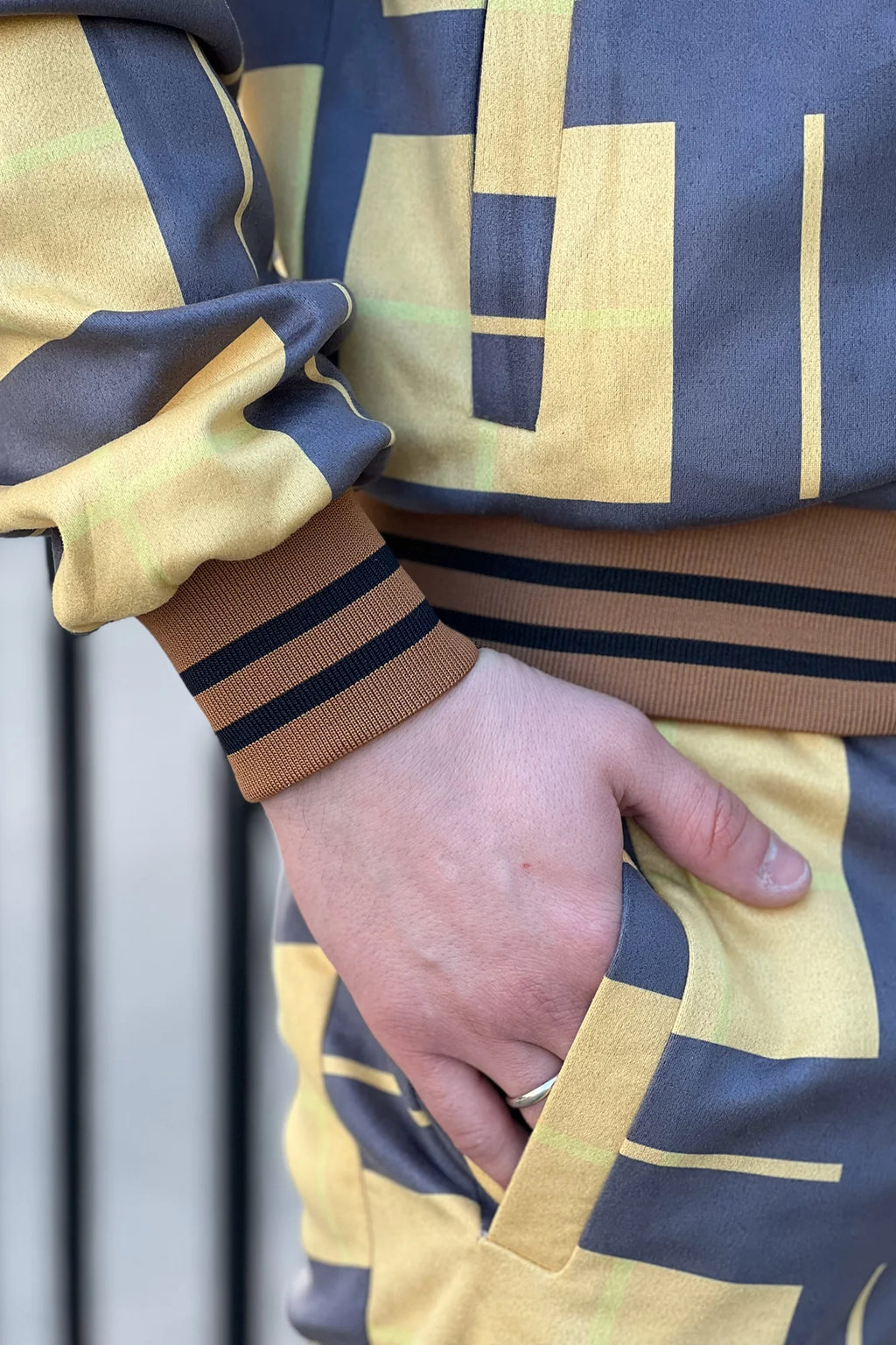 Black and Yellow Windowpane Tracksuit — close-up of the cuff and pocket