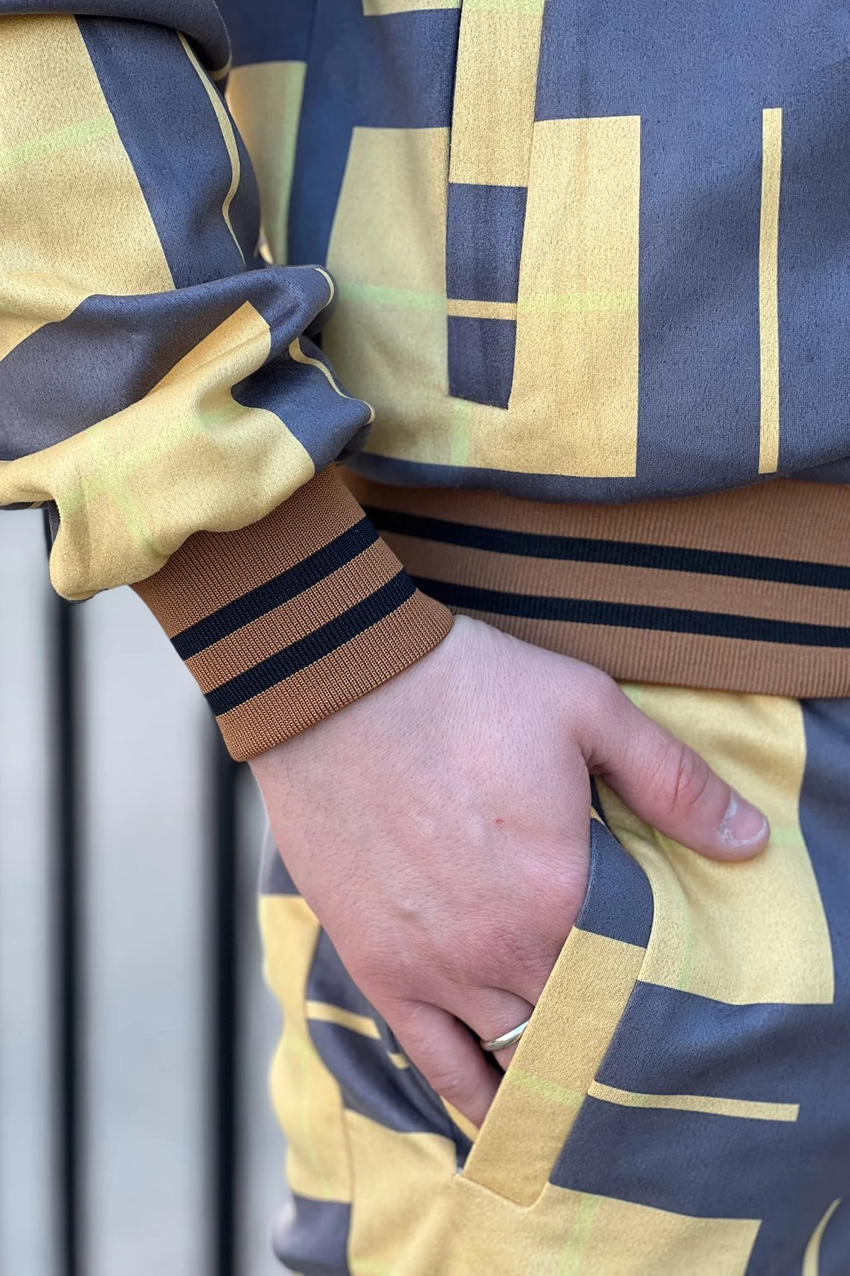 Black and Yellow Windowpane Tracksuit — close-up of the cuff and pocket