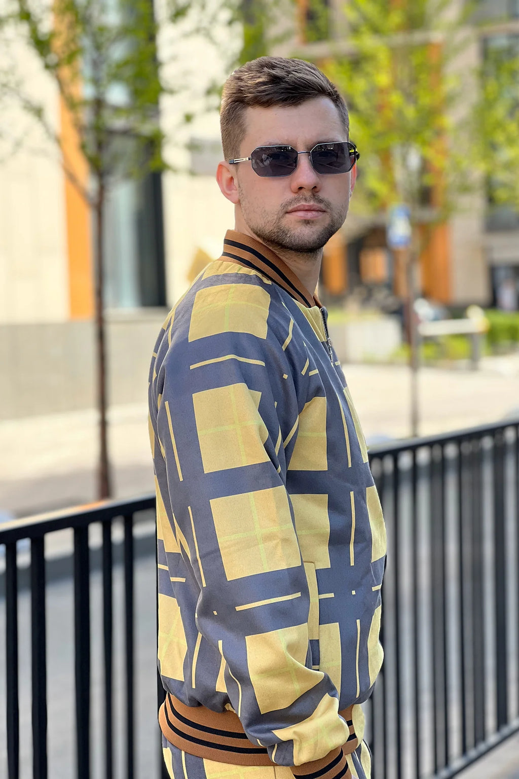 Black and Yellow Windowpane Tracksuit — close-up of the bomber jacket, three-quarter view
