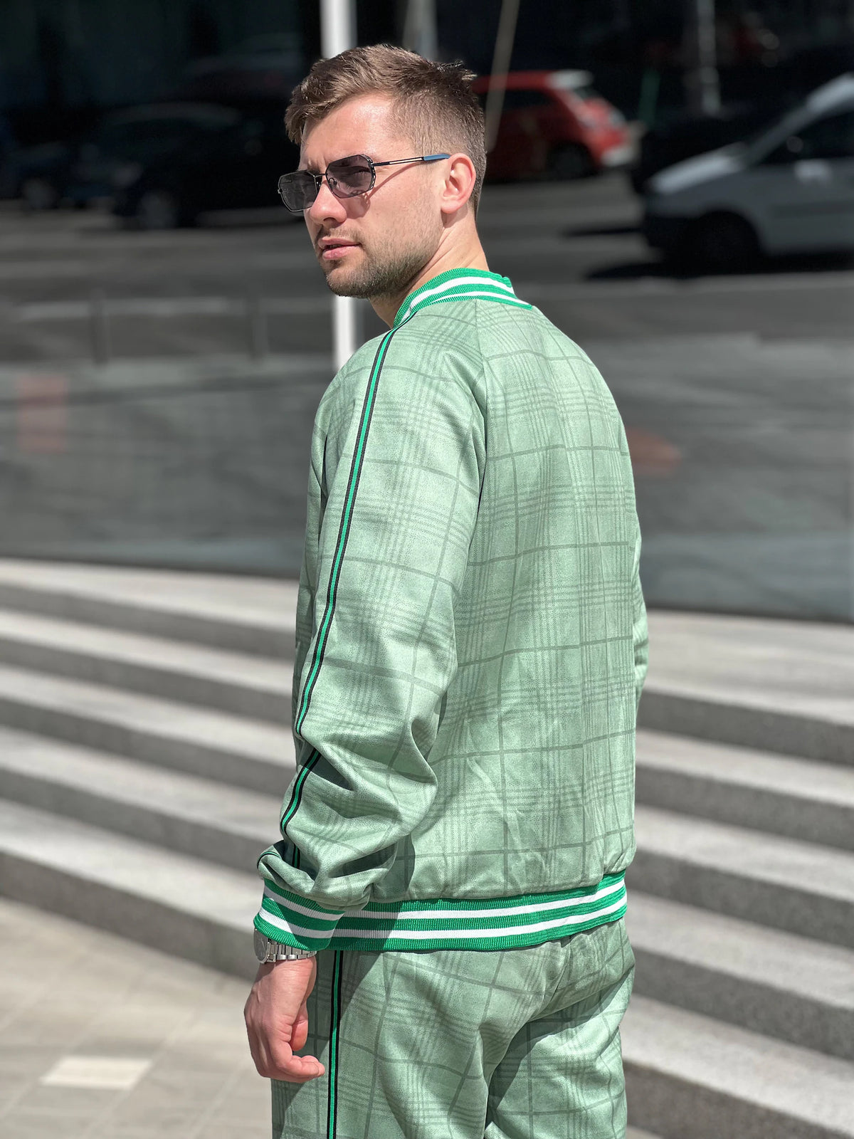 Vivid Green Plaid Gentlemen Tracksuit — close-up of the bomber jacket, three-quarter view