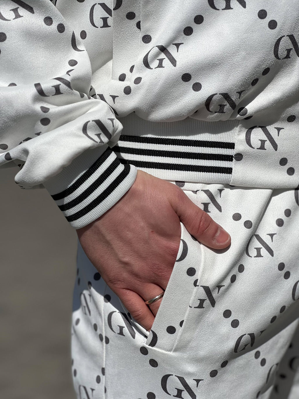 Pearl White Monogram Gentlemen Tracksuit — close-up of the cuff and pocket