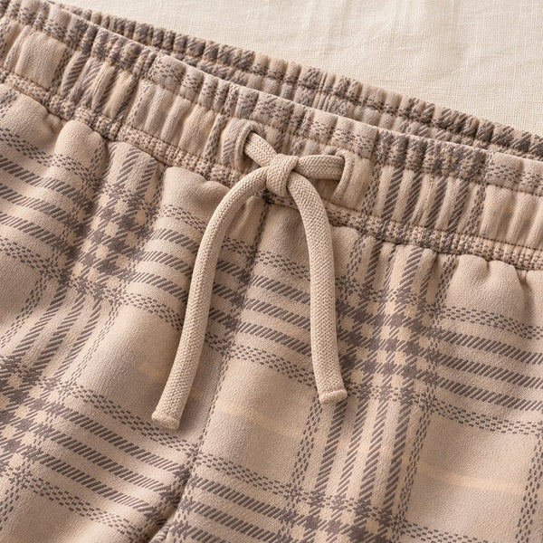 Drawstring waistband on plaid joggers