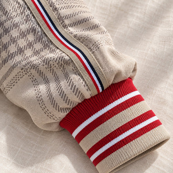 Striped rib cuff and sleeve tape on a plaid bomber jacket