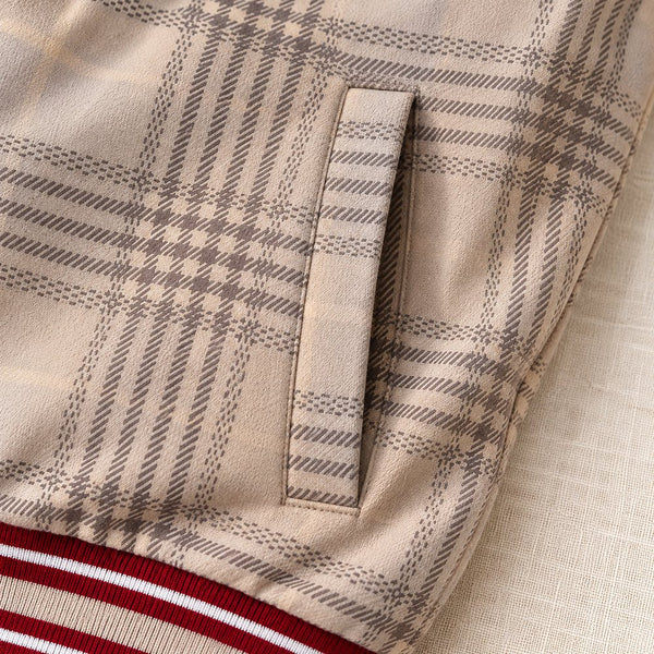 Side welt pocket on a plaid bomber jacket