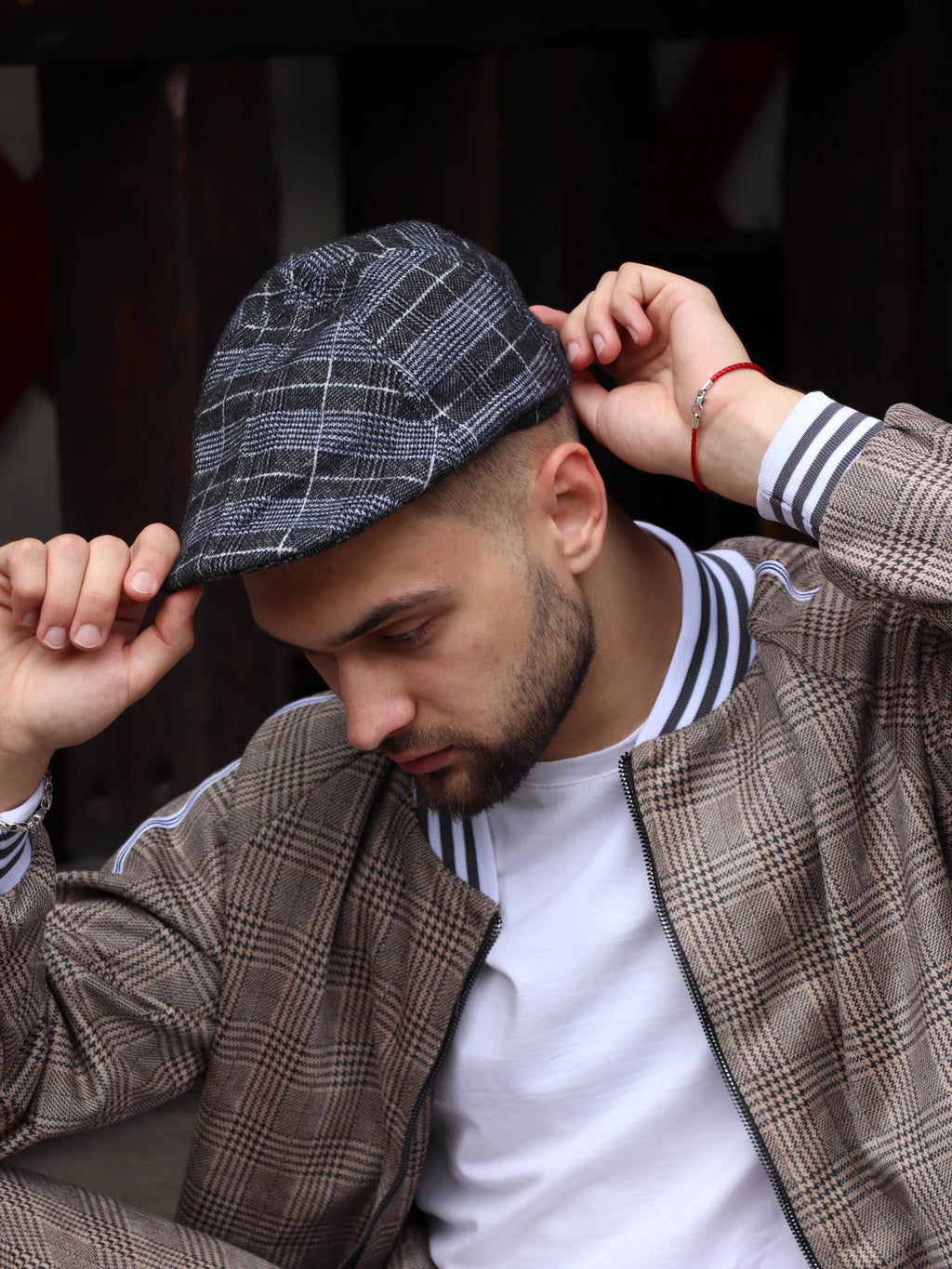 Navy Tartan Flat Cap — tartan flat cap inspired by The Gentlemen, on the model