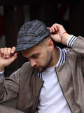 Navy Tartan Flat Cap — tartan flat cap inspired by The Gentlemen, on the model