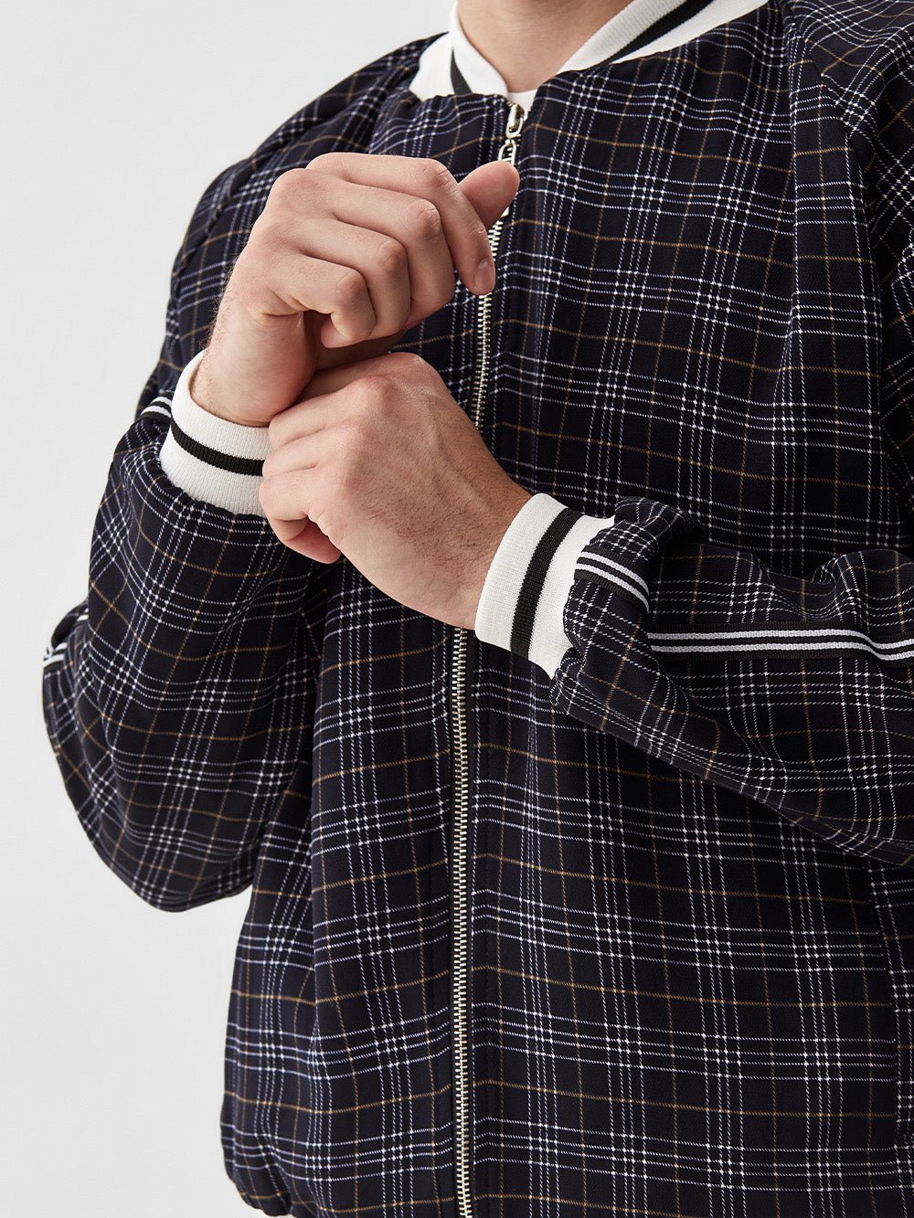 Charcoal Plaid Gentlemen Tracksuit — close-up of the collar and zipper