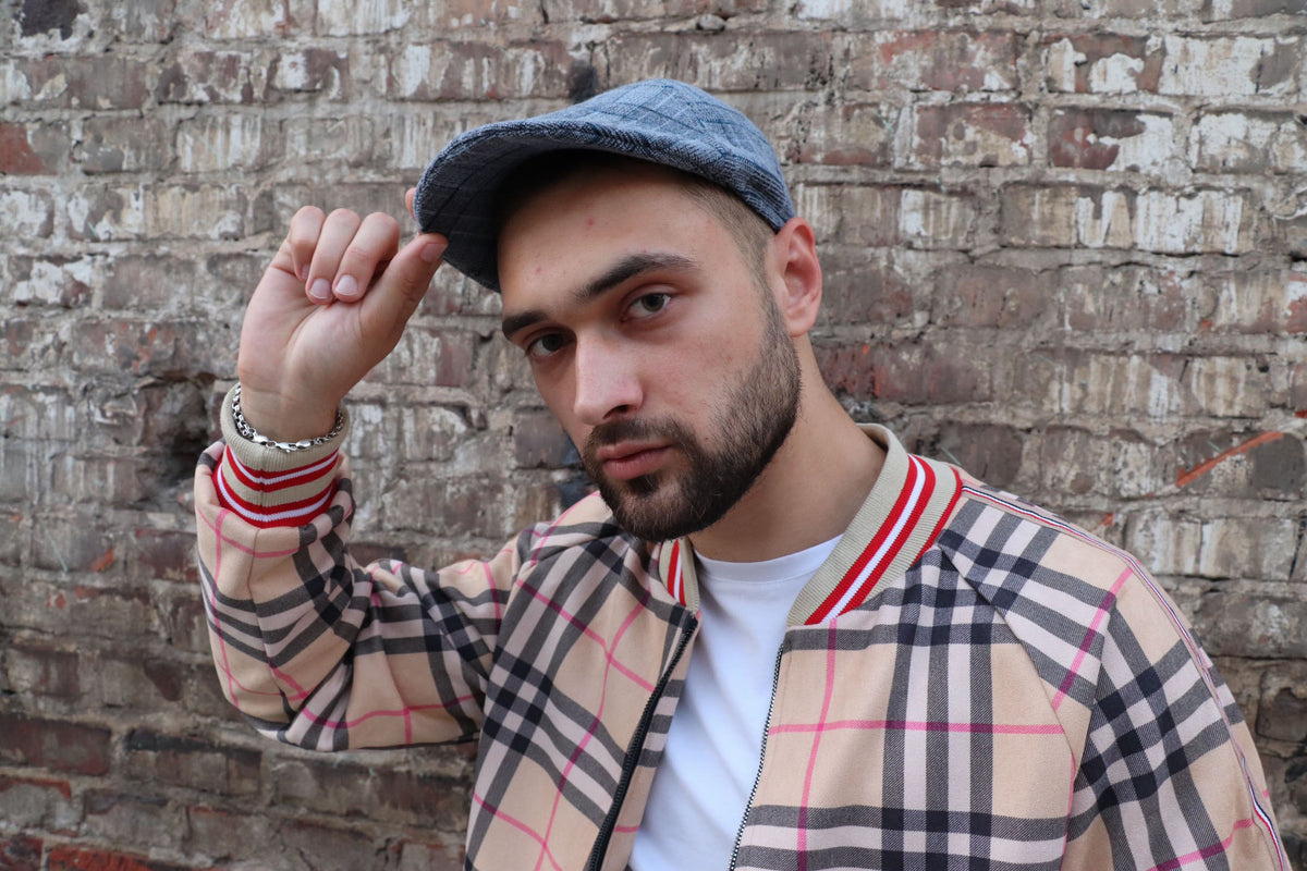 Blue Grey Plaid Flat Cap — on the model, third angle