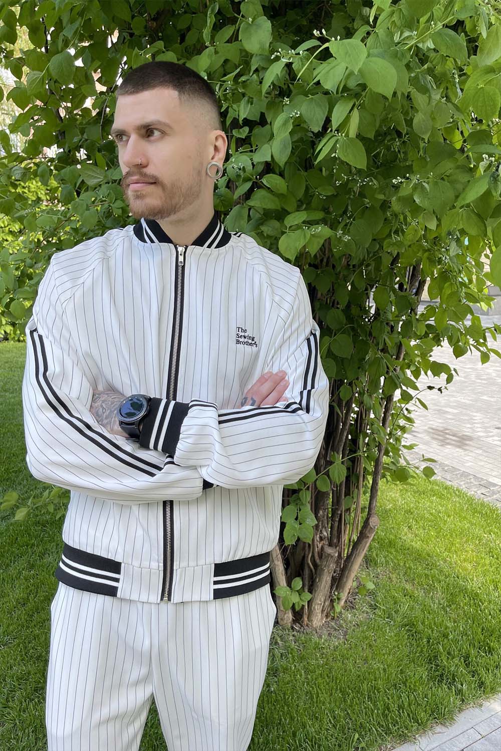 Premium White Pinstripe Colin Farrell Gentlemen Tracksuit — close-up of the bomber jacket, another angle
