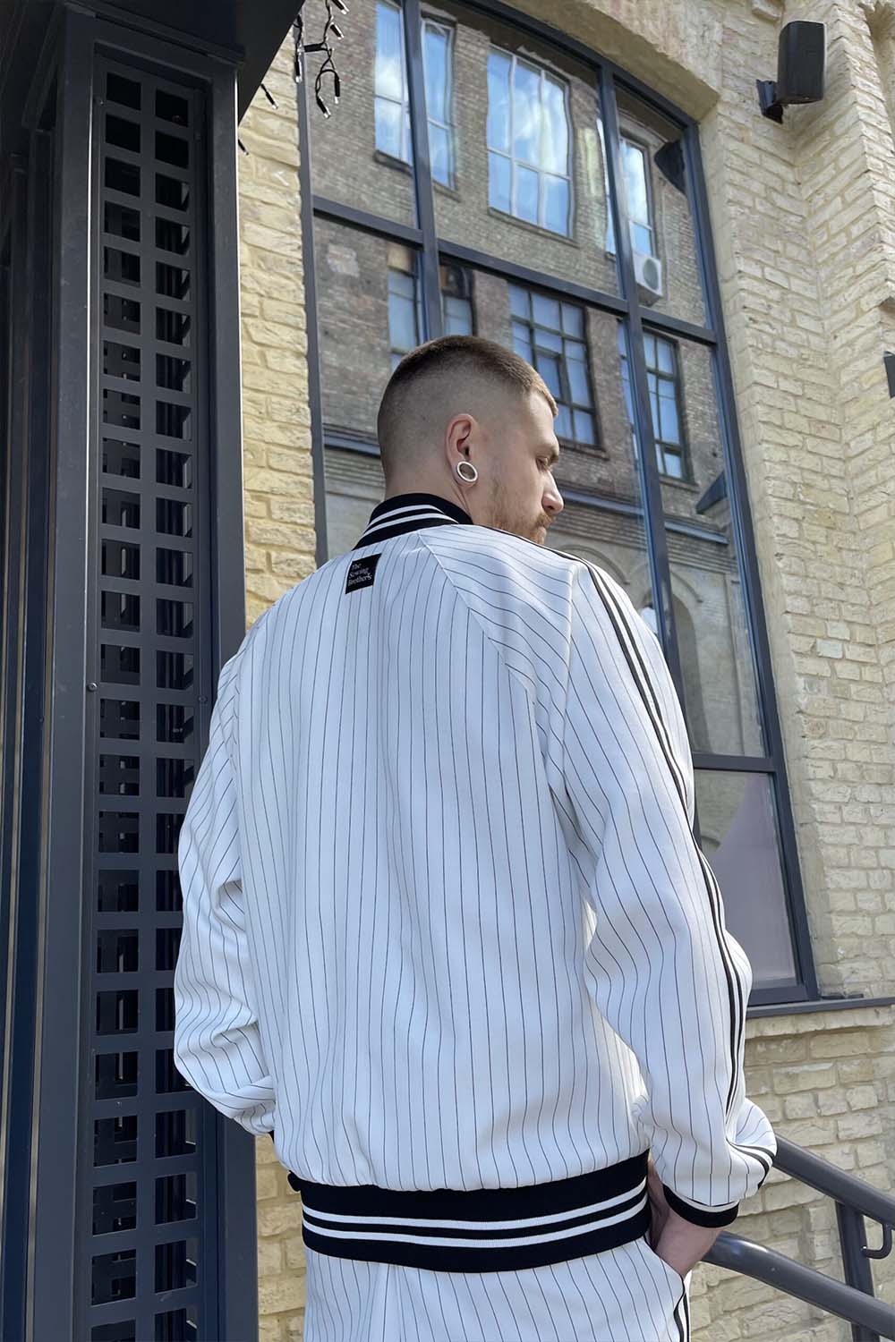 Premium White Pinstripe Colin Farrell Gentlemen Tracksuit — close-up of the jacket back