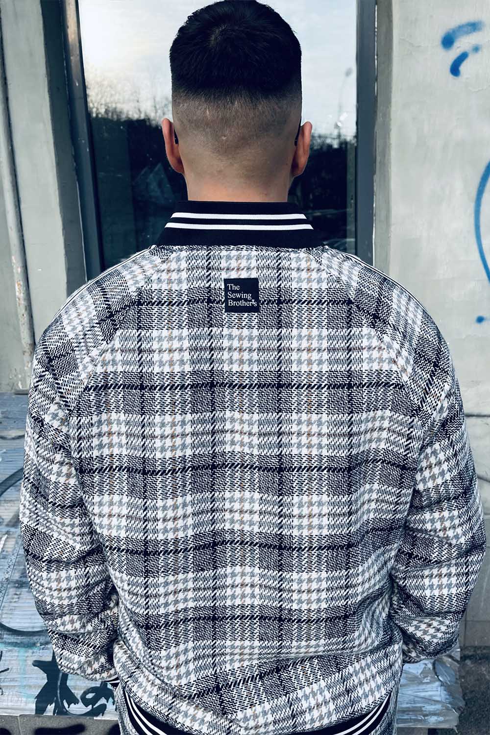 Premium Black & White Glen Plaid Gentlemen Tracksuit — close-up of the jacket back, another angle