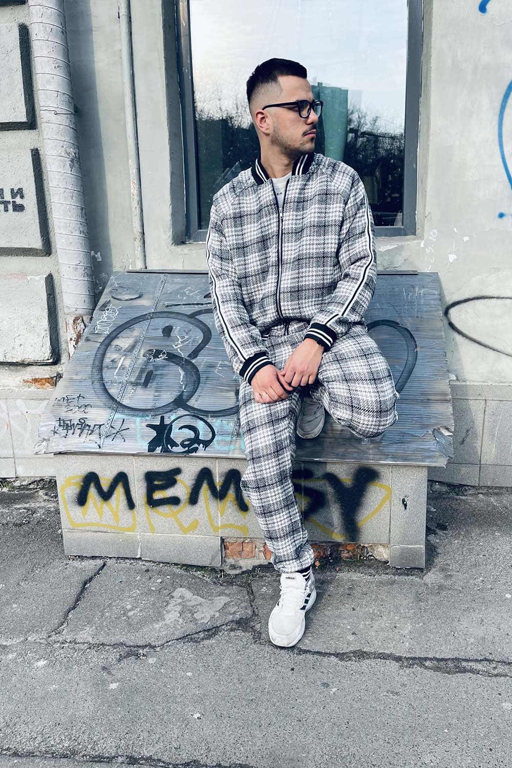 Premium Black & White Glen Plaid Gentlemen Tracksuit — seated pose