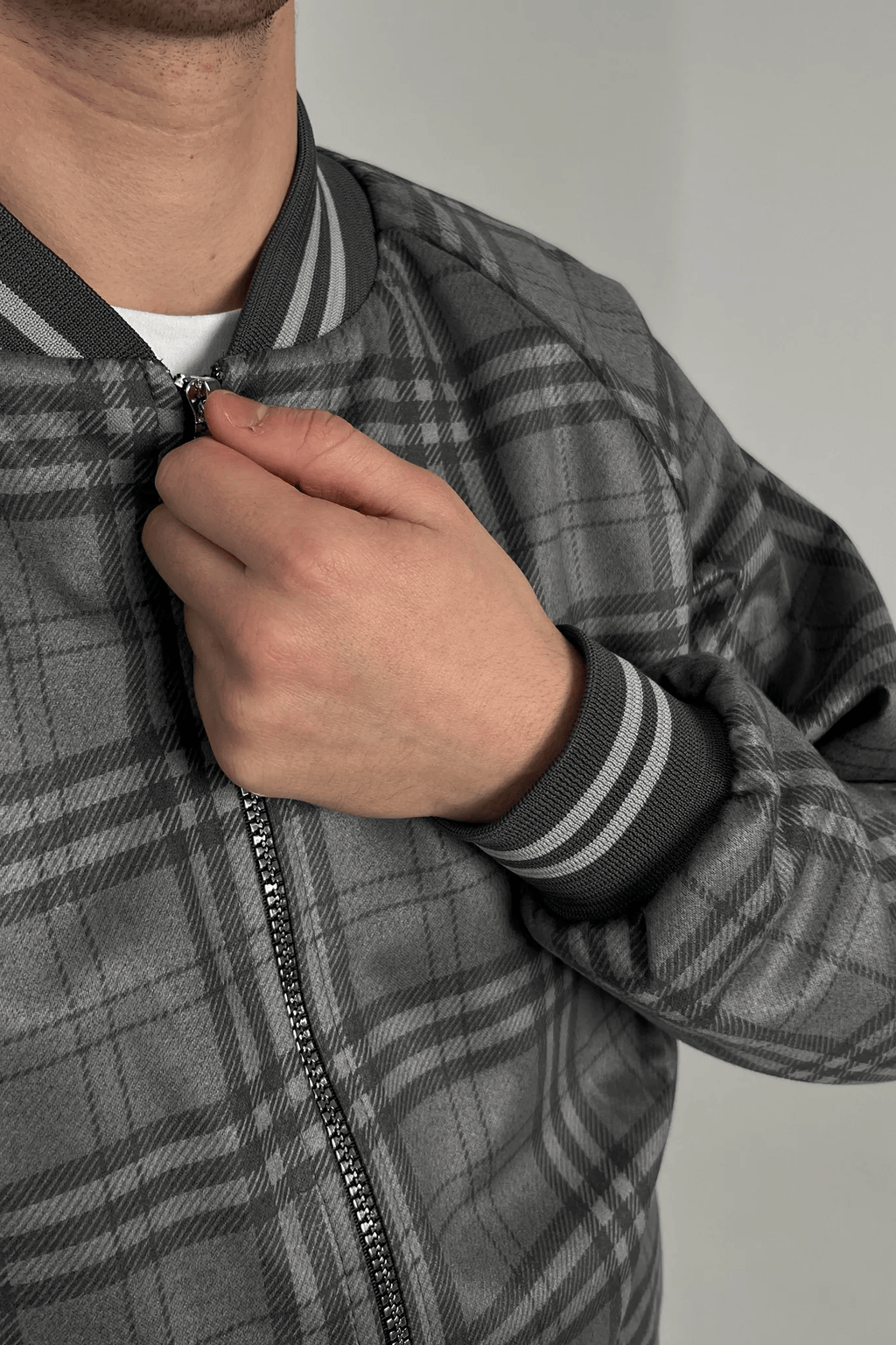 Tartan Tracksuit — close-up of the collar and zipper