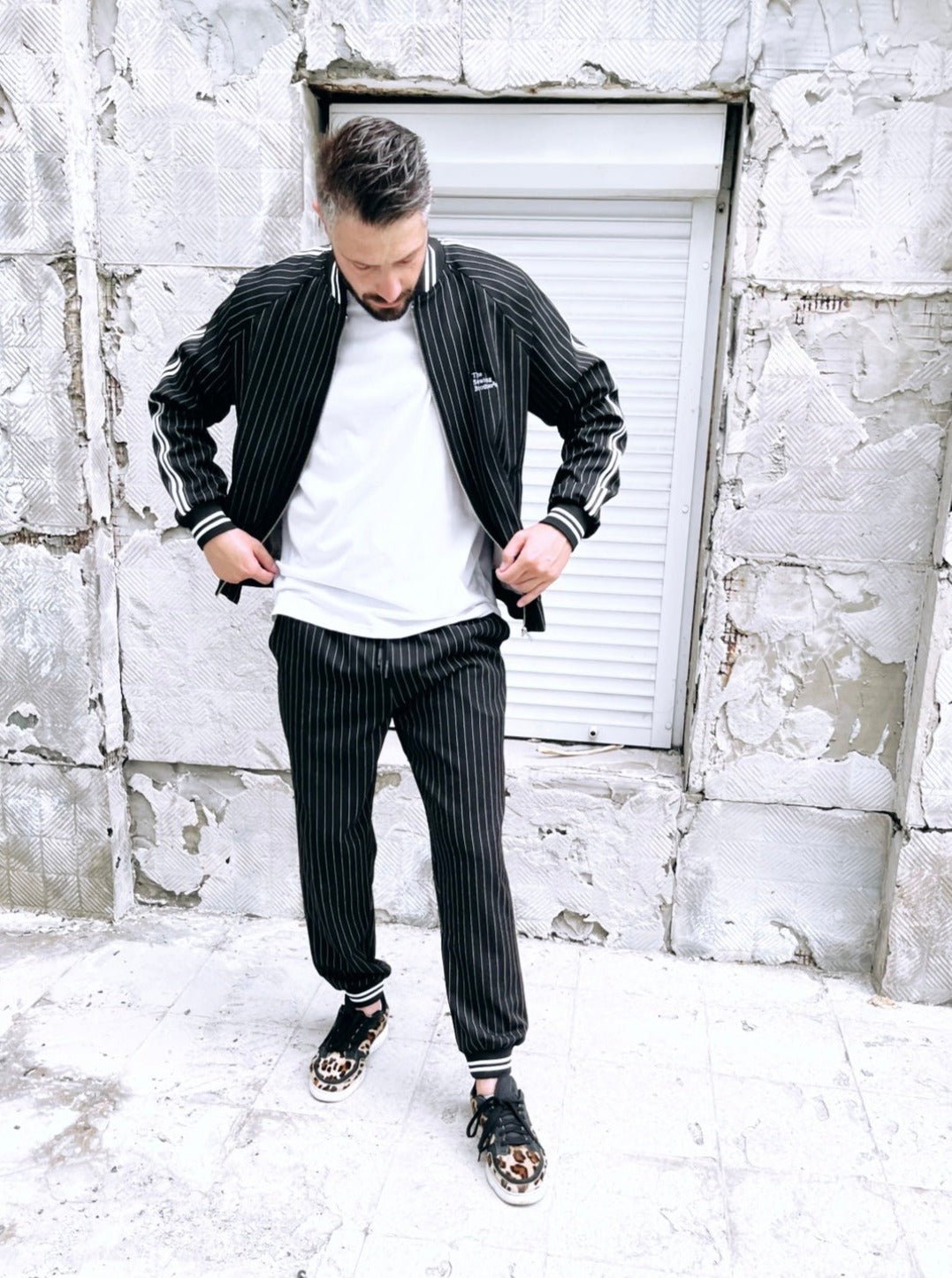 Premium Black Pinstripe Gangster Gentlemen Tracksuit — pinstripe bomber jacket and joggers, front view, jacket open