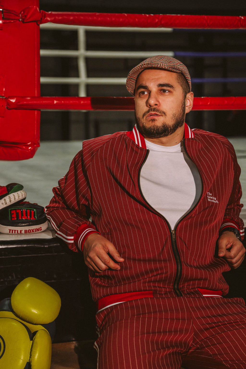 Premium Red Pinstripe Coach Gentlemen Tracksuit — close-up of the bomber jacket