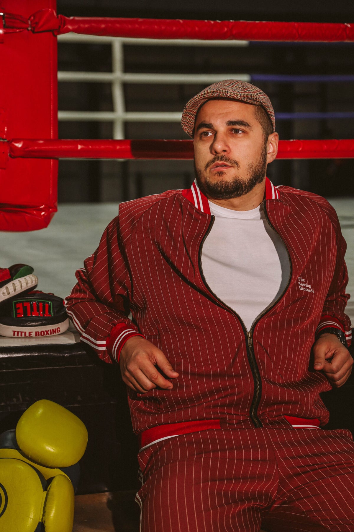 Premium Red Pinstripe Coach Gentlemen Tracksuit — close-up of the bomber jacket
