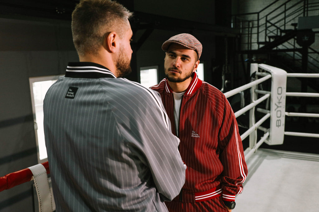 Premium Red Pinstripe Coach Gentlemen Tracksuit — group photo