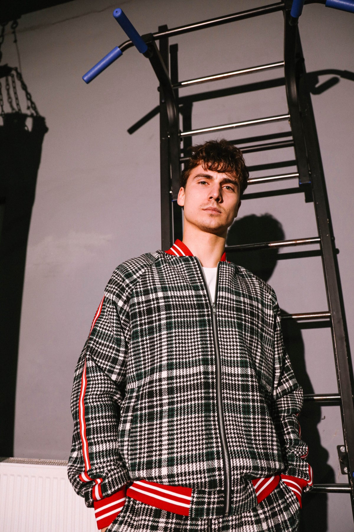 Premium Emerald Houndstooth Gentlemen Tracksuit — close-up of the bomber jacket, another angle