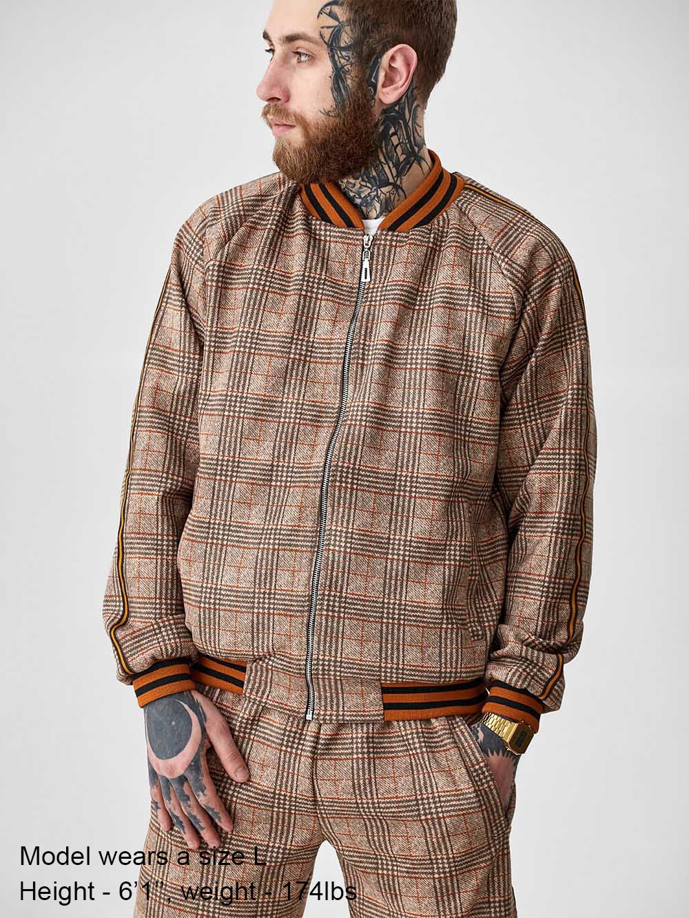 Tan Glen Plaid Gentlemen Tracksuit — close-up of the bomber jacket, three-quarter view