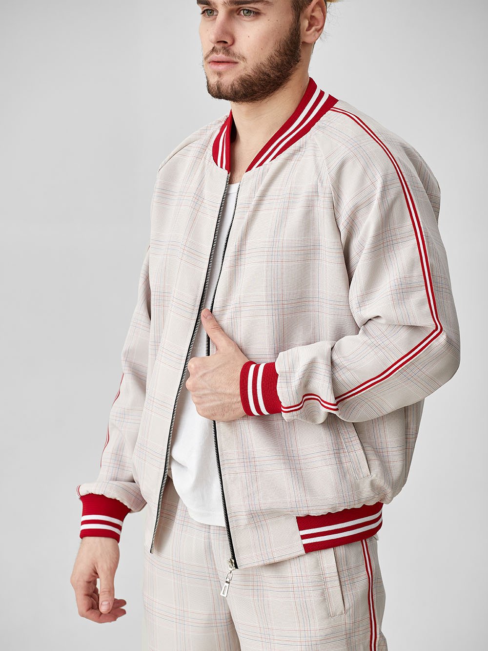 Ivory Glen Plaid Gentlemen Tracksuit — close-up of the jacket, side view