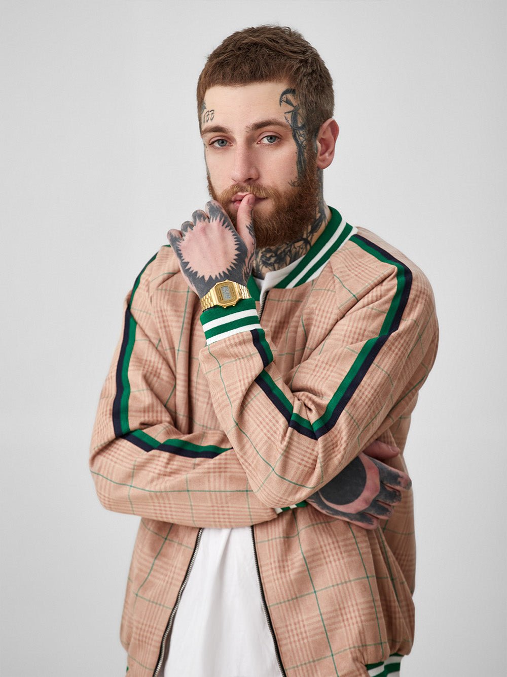 Peach Glen Plaid Gentlemen Tracksuit — close-up of the bomber jacket, three-quarter view