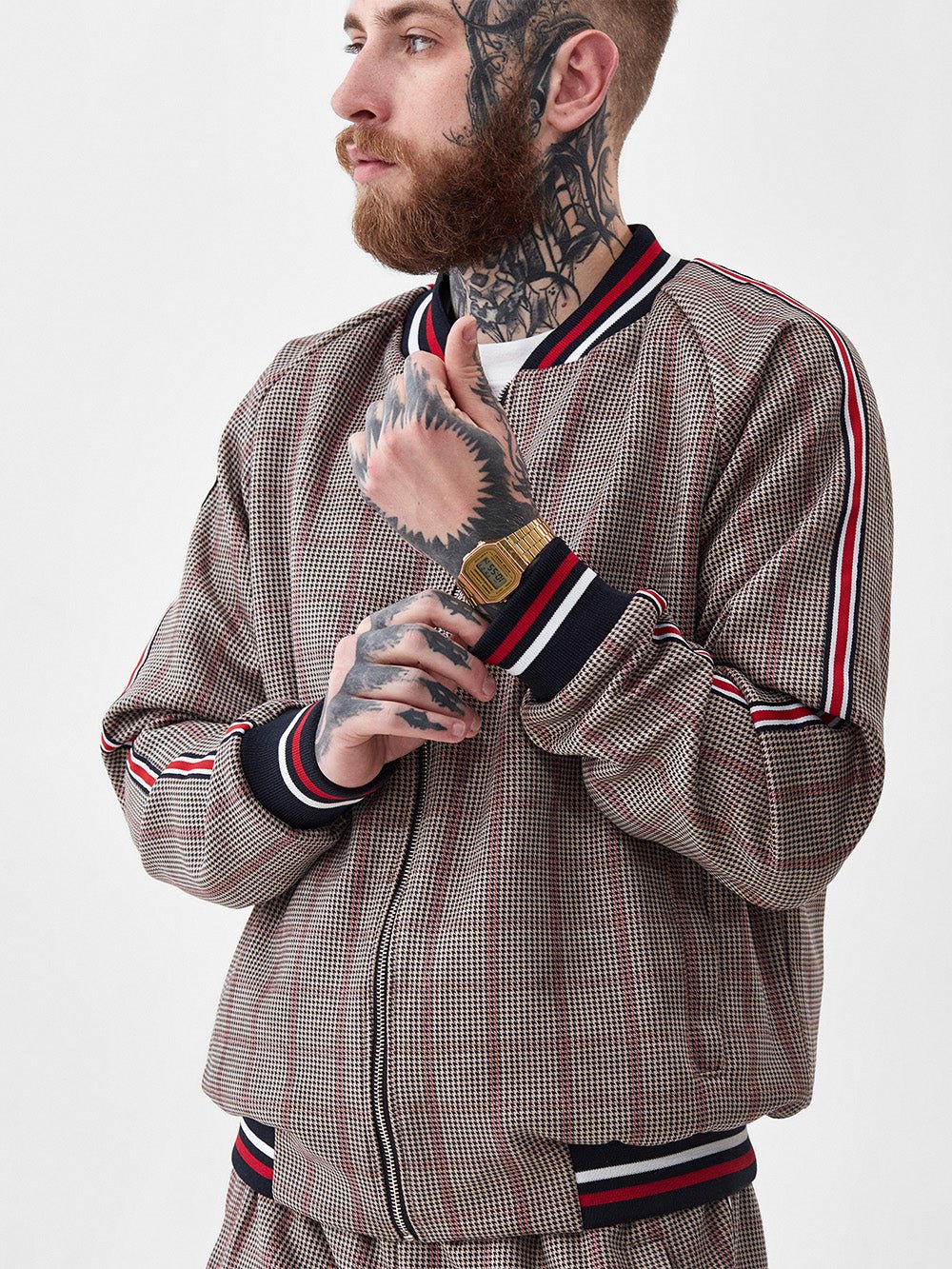 Brown Glen Plaid Gentlemen Tracksuit — close-up of the bomber jacket, three-quarter view