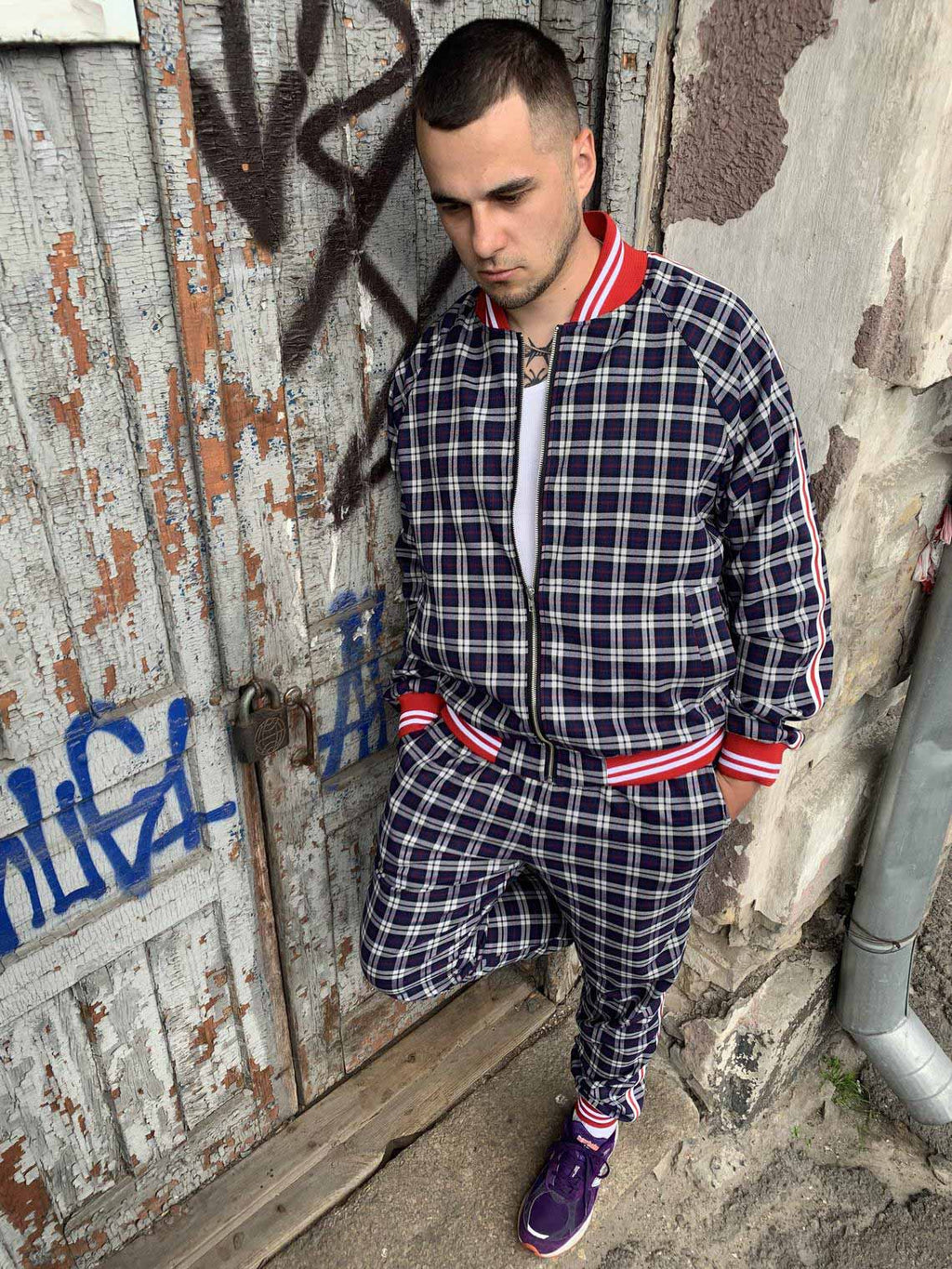 Premium Navy Check Gentlemen Tracksuit — seated pose