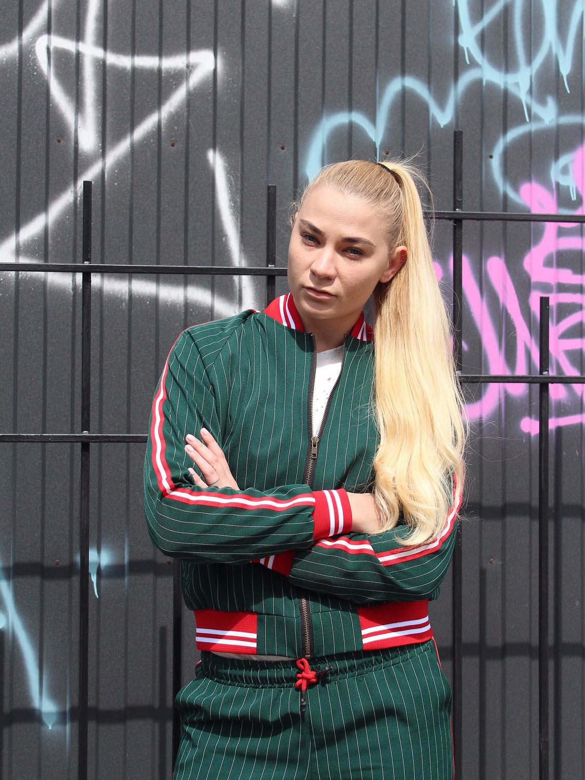 Premium Women's Green Pinstripe Tracksuit — close-up of the bomber jacket