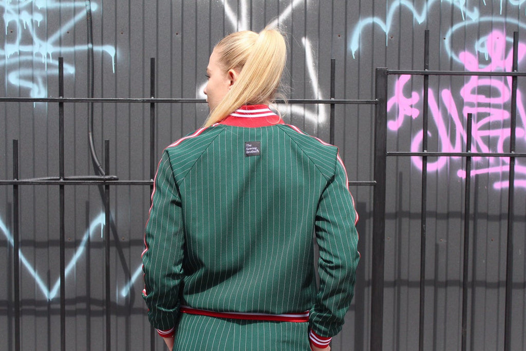 Premium Women's Green Pinstripe Tracksuit — close-up of the jacket back