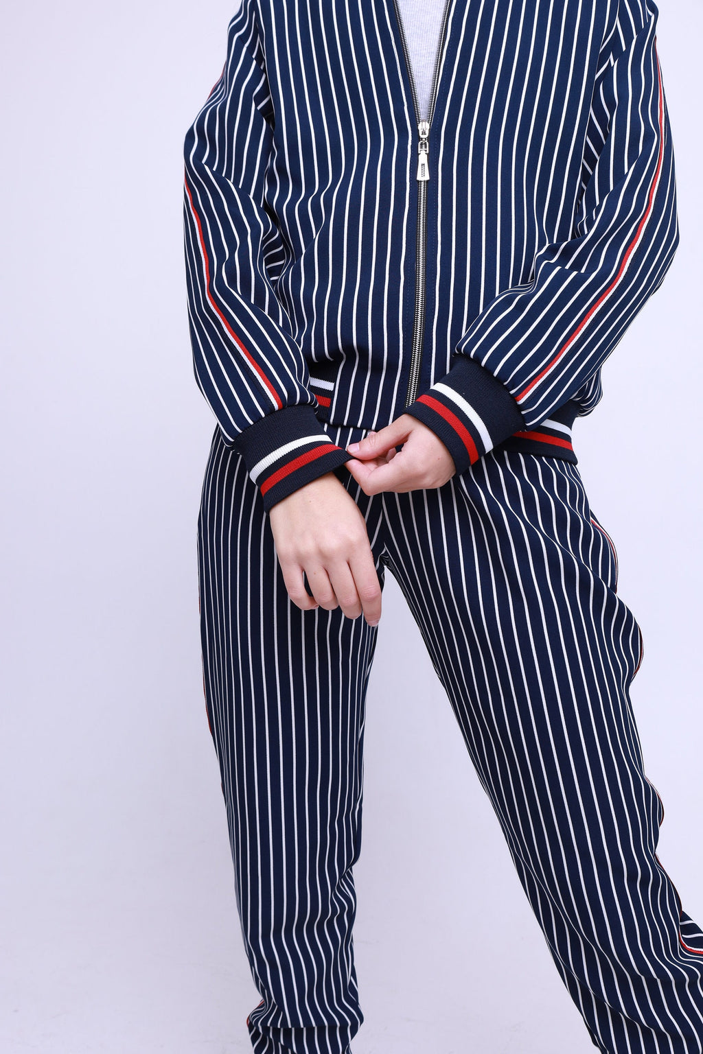 Women's Navy Pinstripe Tracksuit — close-up of the jacket and joggers