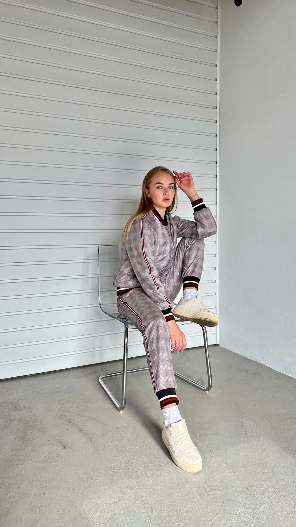 Women's Mauve Glen Plaid Tracksuit — seated pose, third angle