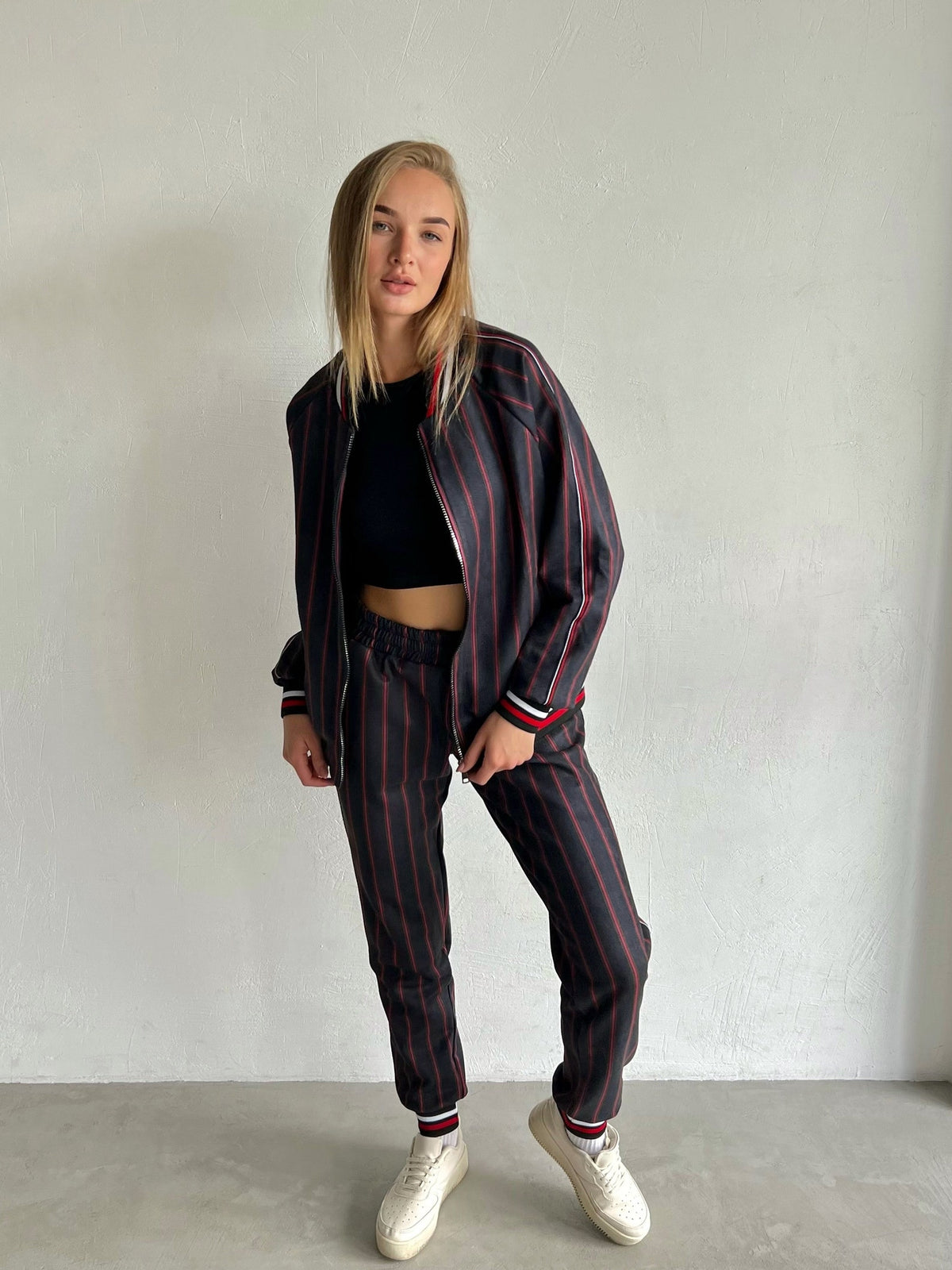 Women's Charcoal Pinstripe Tracksuit — three-quarter front view