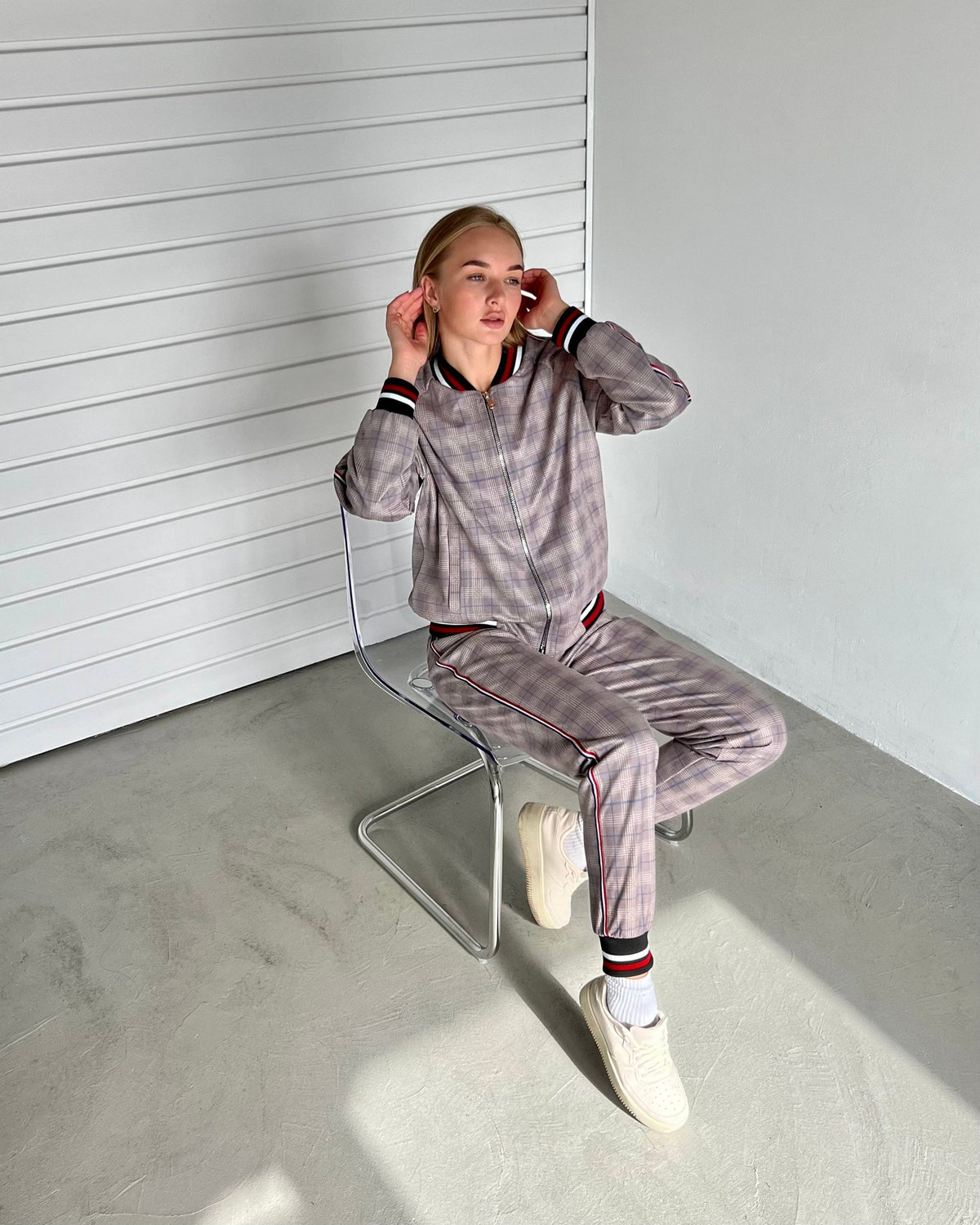 Women's Mauve Glen Plaid Tracksuit — seated pose, another angle