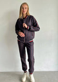 Women's Charcoal Pinstripe Tracksuit — pinstripe bomber jacket and joggers inspired by The Gentlemen, front view